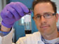 Jacob Lanphere holds a sample of graphene oxide