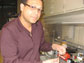 Alamgir Karim holds a strip of the polymer