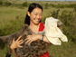 Nora Lewin holding a hyena