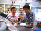 researchers and Bruce Logan in lab