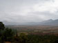 rain rolls in on agricultural land