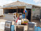 a convenience store on the refugee camp's street