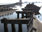 Remains of collapsed bridge, surrounded by water