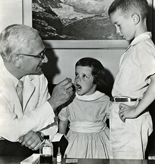 Albert B. Sabin with two children
