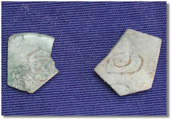 Photo of Greenstone plaque fragments (Size: 16KB)