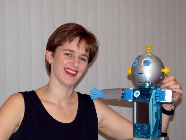 Photo of woman and a robot