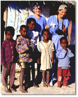 Shown here are a dentist and doctor, together with children of Berivotra village; caption is below