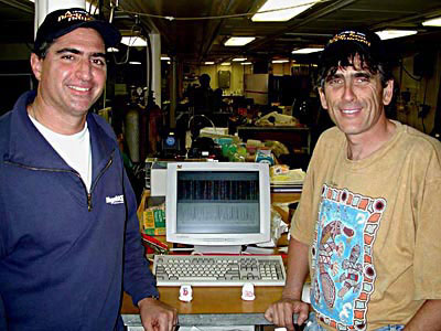 Robert Feldman (left), of Amersham Biosciences, and Craig Cary, University of Delaware; caption is below
