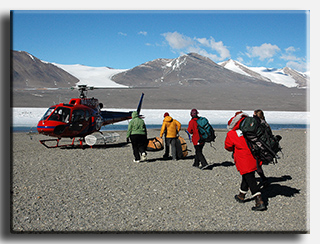 A helicopter lands near the Beardmore Camp in the Transantarctic Mountains