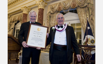 NSB Awards Chairman Ray Bowen presents the 2010 Vannevar Bush Award to Bruce Alberts.