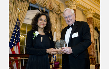 NSB Awards Committee Chairman Ray Bowen presents 2010 Public Service Award to Nalini Nadkarni.