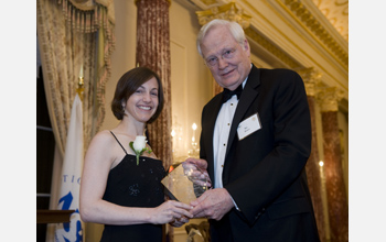 NSB's Ray Bowen presents 2010 Public Service Award to EYH President Rachel Sheinbein.