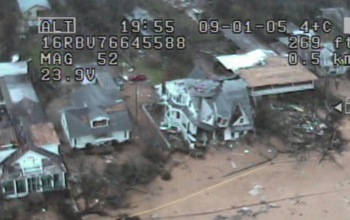 screencapture from a UAV showing dmaged houses in a distaster area in Mississippi