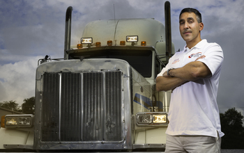 Virginia Tech Transportation Institute research scientist Jeffrey Hickman with a truck.