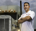 Virginia Tech Transportation Institute research scientist Jeffrey Hickman with a truck.