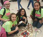 Southwest ISD pose with science crafting material.