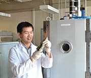 Guojian Wang of the University of South Dakota in his lab.