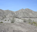Photo showing a scarp offsetting the ground along a fresh rupture of the Borrego Fault.