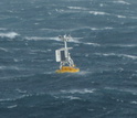 A surface buoy bobs in waves at the OOI Global Argentine Basin site in the Southern Hemisphere.
