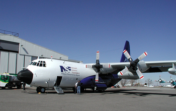 The NSF/NCAR C-130 aircraft outside a hangar