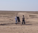 Scientists set up fog collectors in the Namib to collect fog water for chemical analyses.