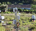 LIDAR and aerosol-sensing instruments at a Perdigão research site; LIDAR units map the wind flow field.