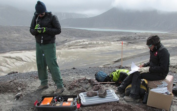 scientists with equipment out in the field