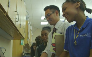 students and teacher in a classroom