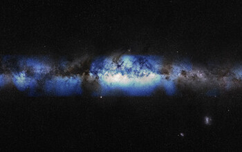 A composite image of an optical view of the Milky Way along with the first neutrino-based image.