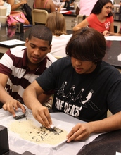 high-school students analyzing ore