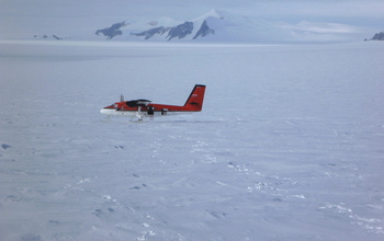 A Twin Otter aircraft on snow covered ground