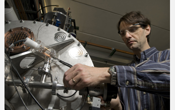 Senior physicist Daniel Bazin adjusts the radio frequency fragment separator at the NSCL at MSU