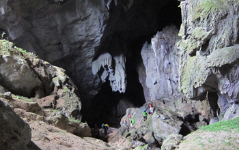 Researchers climb out from Cobweb Cave at Gunung Mulu National Park in Borneo