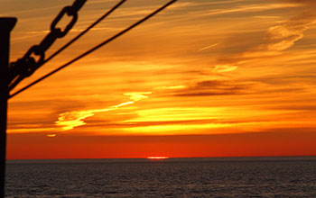 Sunset at the deepest point in Lake Superior during the University-National Oceanographic Laboratory System chief scientist training cruise onboard the R/V <em>Blue Heron</em>.