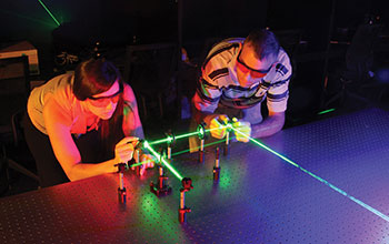 Student working with laser