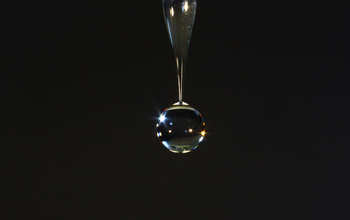 Soundwaves' force pulls droplet from nozzle