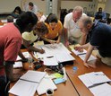 groups of teachers working at a table