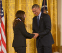 President Obama presents the National Medal of Science to awardee May Berenbaum