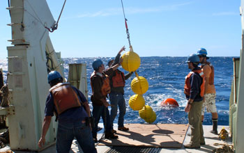 Photo of mooring operations on deck of the research vessel Knorr.