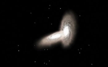 Screen capture of simulation showing two colliding galaxies.