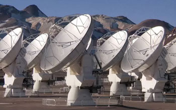 Screen showing array of satellite dishes at the ALMA site.
