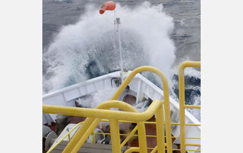 Photo of the JOIDES Resolution encountering rough seas during the transit to Antarctica.