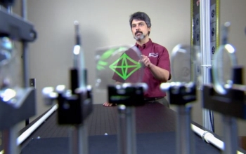 researcher pointing at an AR shape