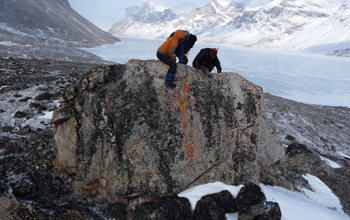Studying boulders on Baffin Island