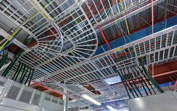 Photo of multiple data cables in the ceiling