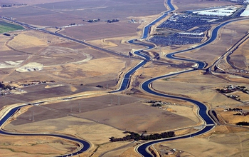 California has a complex water distribution system: here, the California Aqueduct in dry farmland.