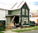 Photo of a house in inner-City Buffalo being restored by good-paying green jobs.