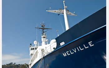 Photo of the Melville underway on an oceanographic expedition.
