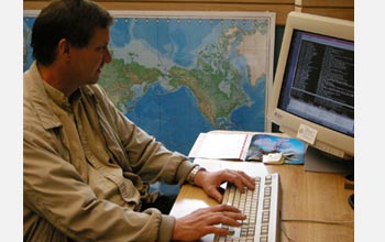 Photo of University of Colorado Engineering Professor Tom Chase working at his computer.
