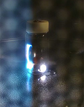 in a microwave oven, sparks are generated inside a glass vial